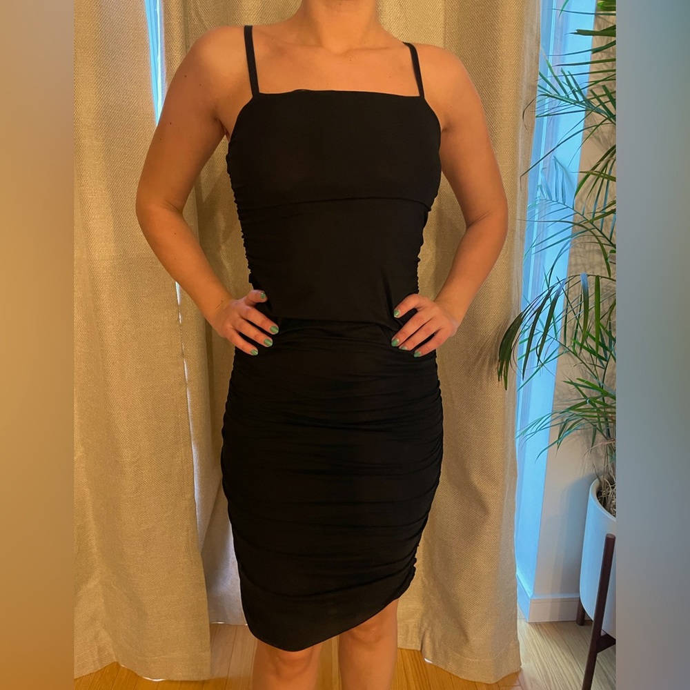 Never worn, elegant and comfy dress